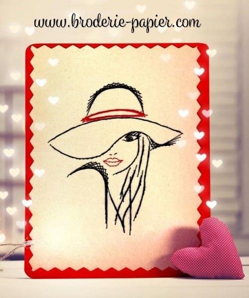 Broderie sur papier la fille au grand chapeau