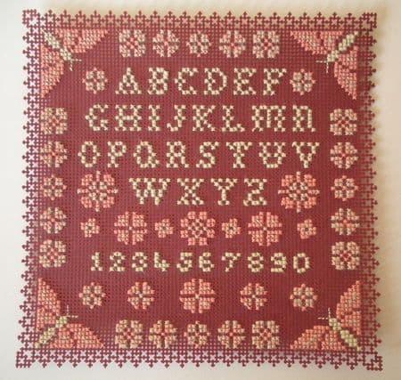 Broderie sur papier point de croix carton feuille perfore trou bordeaux abecedaire