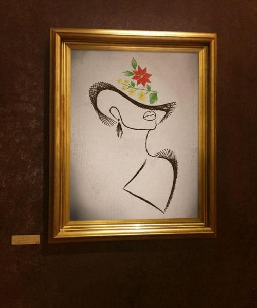 Femme chapeau fleurs boucle d oreille tableau a composer broderie papier fil tendu string art epaule nu