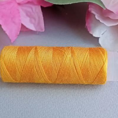 Orange fil a coudre couture bobine broderie sur papier string art carte a broder